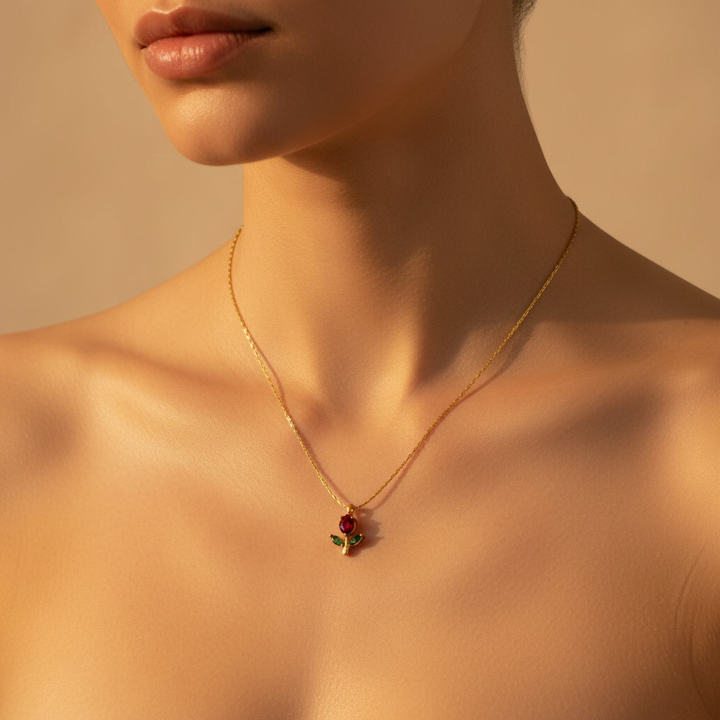 Close-up of the secure lobster clasp and the high-quality 18K gold plating of the rose pendant necklace.
