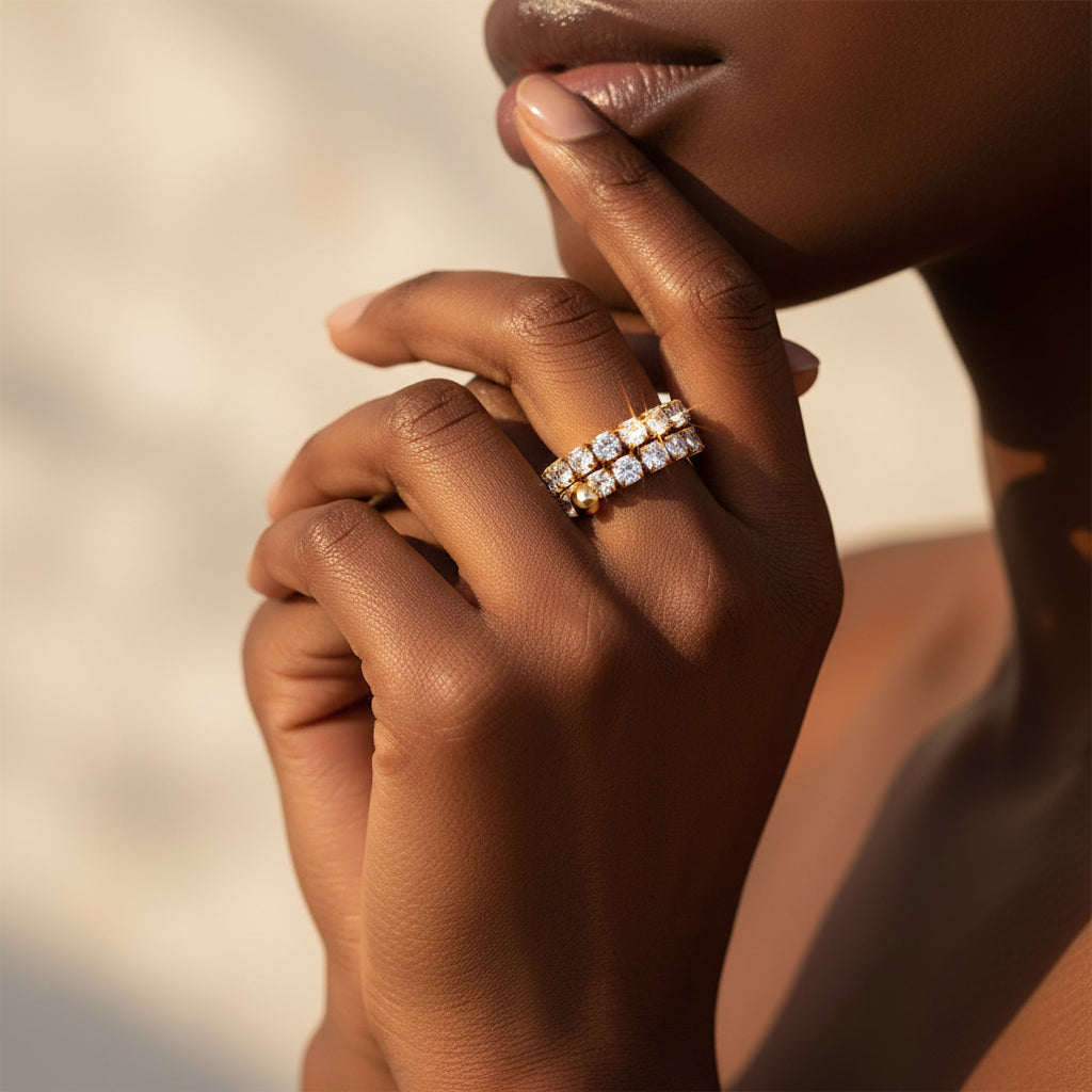 Black female model wearing the Celeste Lumi Adjustable Ring in a luxury jewellery campaign.