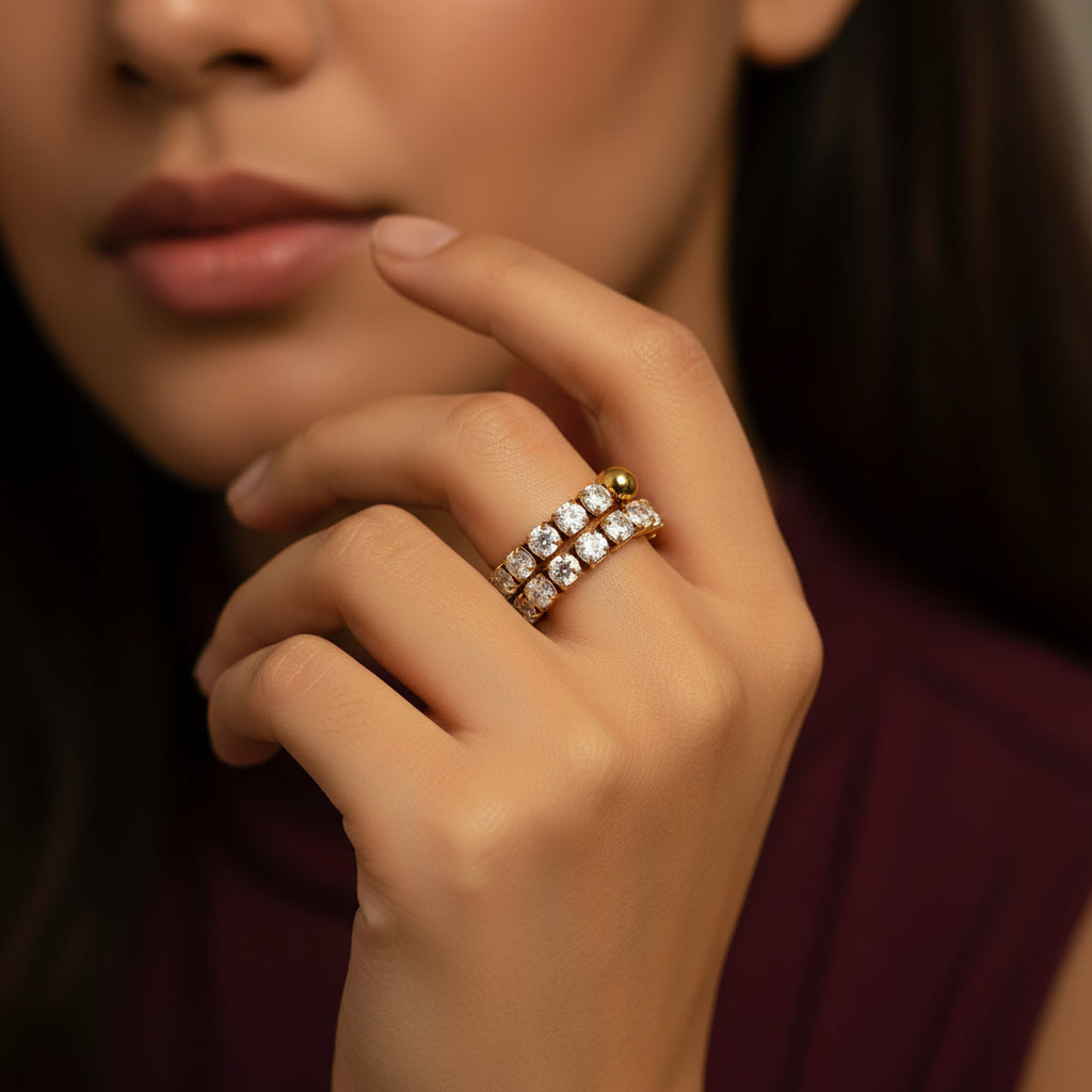 Woman wearing the Celeste Lumi Adjustable Ring with focus on the sparkling double-row design.