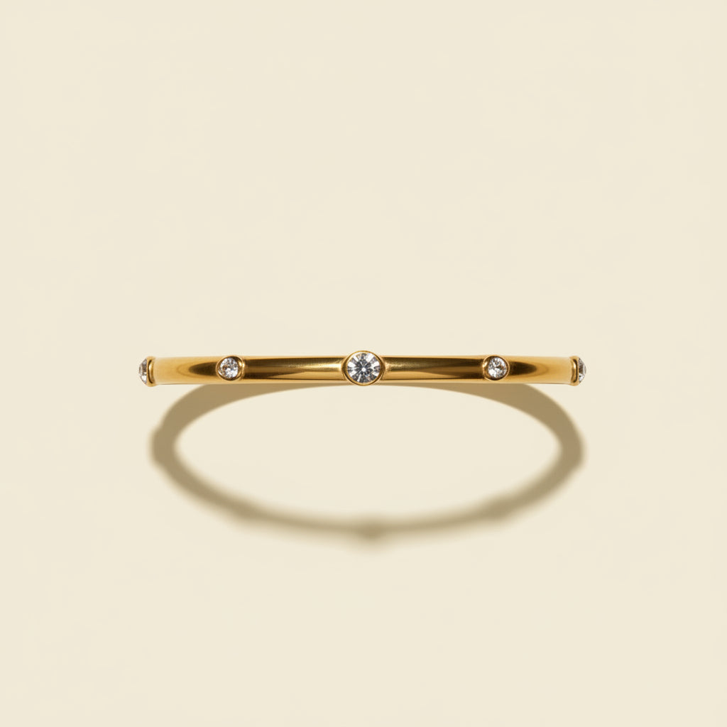 Classic Spark Bangle close-up of sparkling cubic zirconia stones in gold finish