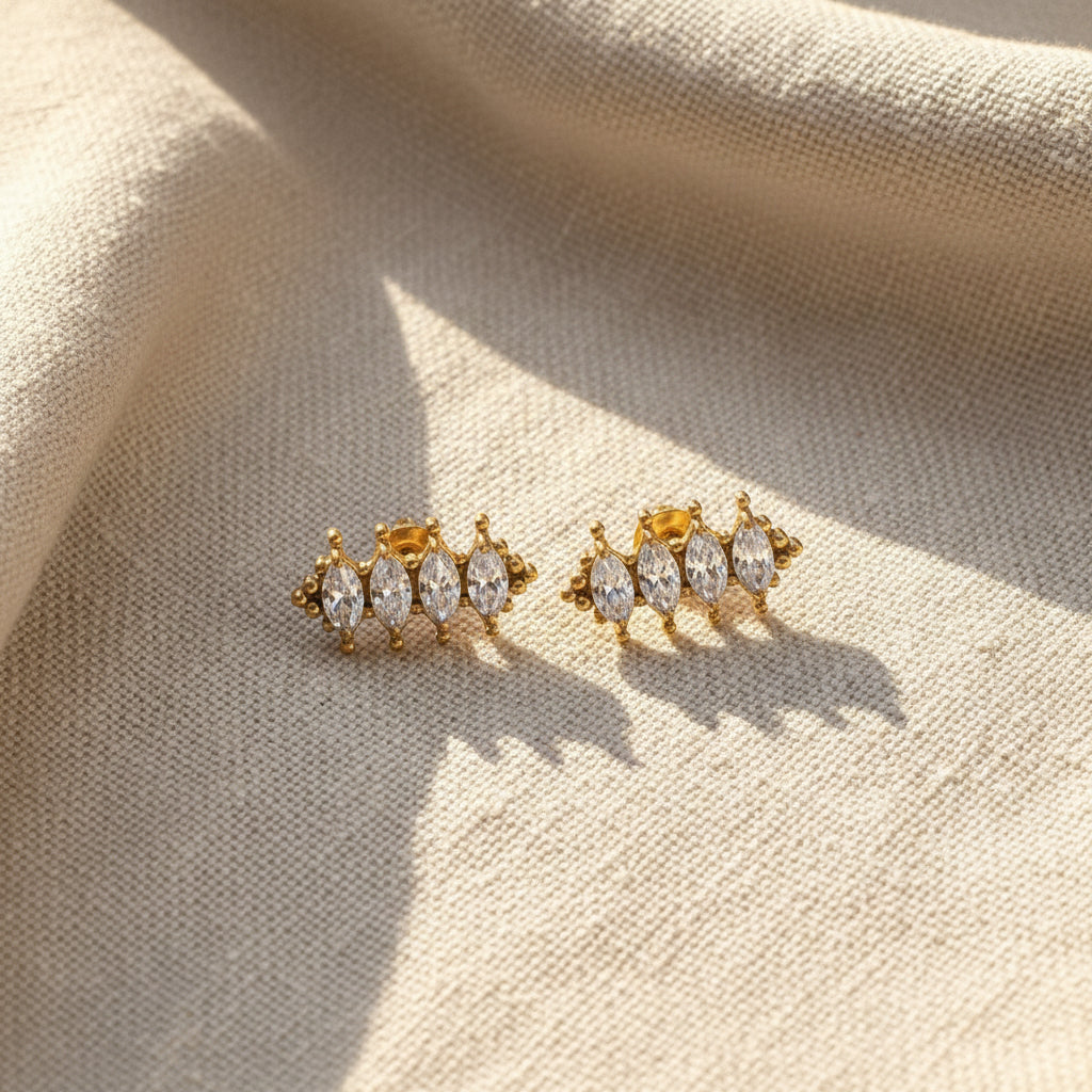 Crystal Stack Stud Earrings pair flat lay – gold plated stud earrings by Swikaar