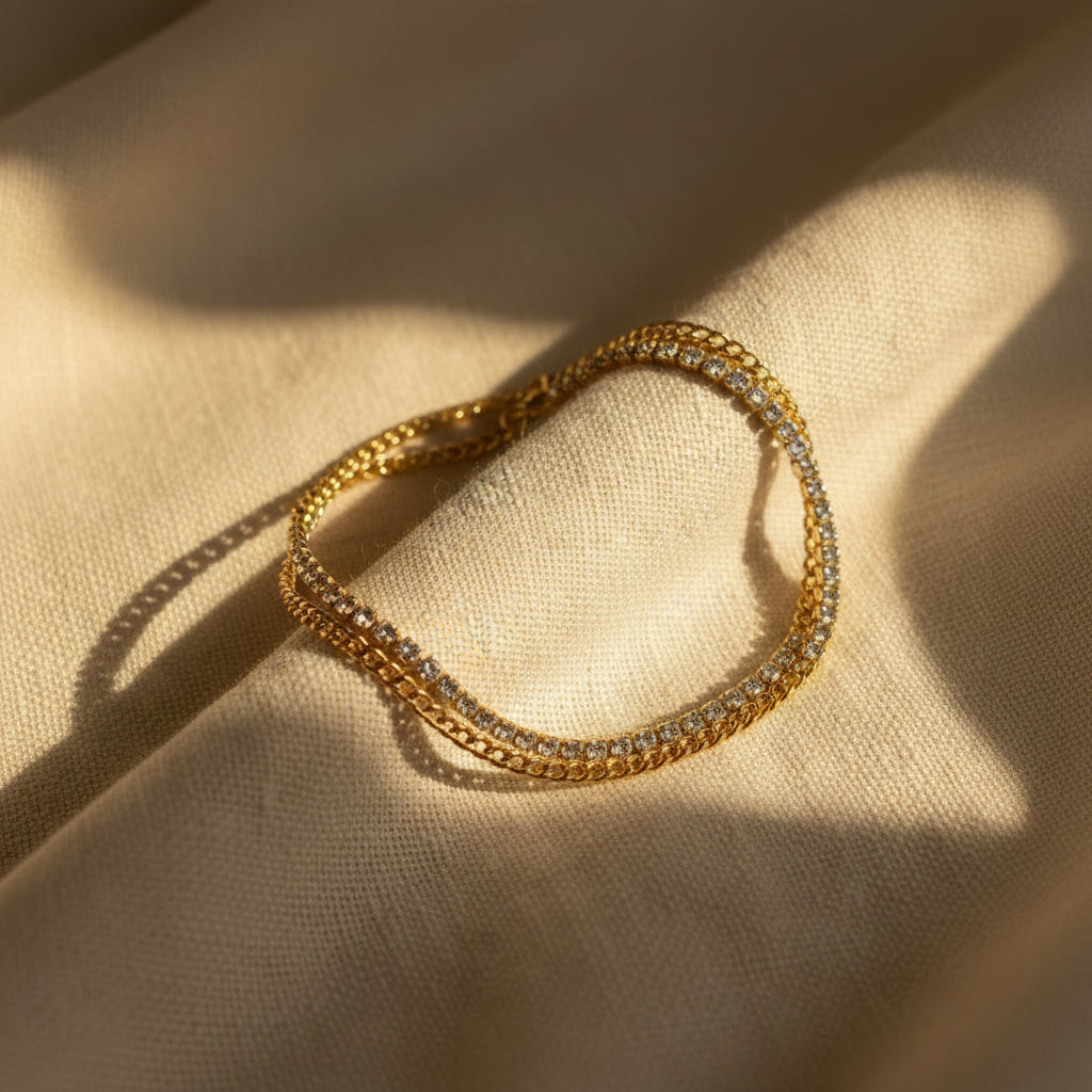 Dual Layer Bracelet close-up of gold chain and sparkling crystal tennis layer in gold plated setting