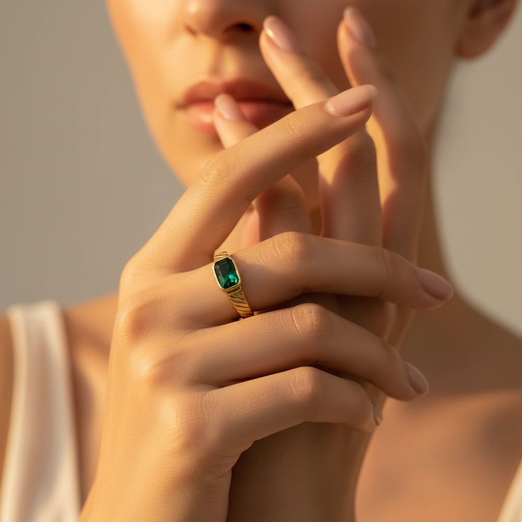 Emerald Royale Statement Ring worn on finger – bold gold emerald green stone ring for women