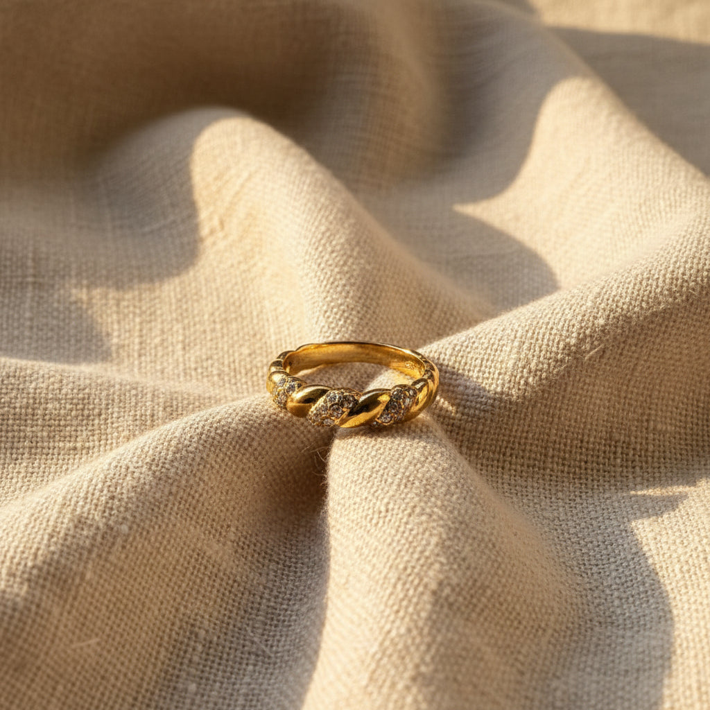 Swikaar Gold Textured Twist Ring worn on finger – gold plated