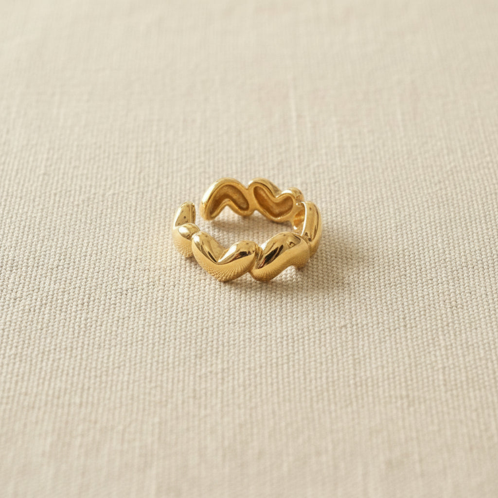 Golden Heart Link Statement Ring worn on finger – bold gold heart ring for women by Swikaar