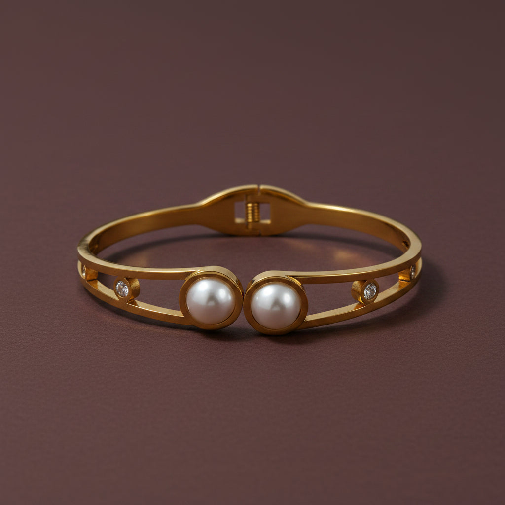 18K gold plated pearl and crystal bangle bracelet displayed on a luxury catalogue background