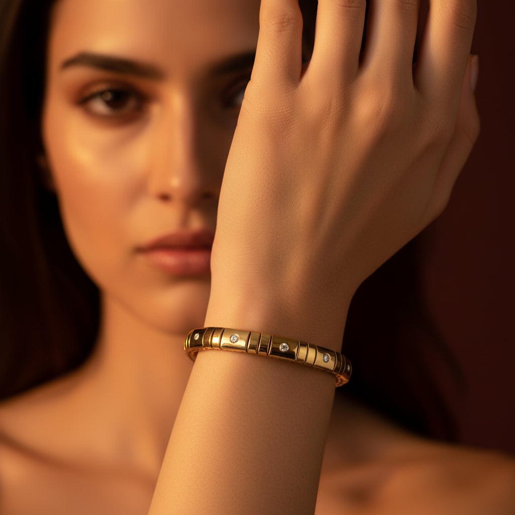 A model wearing the Celestia Glissade Bracelet to showcase its flexible fit and radiant shimmer on the wrist.