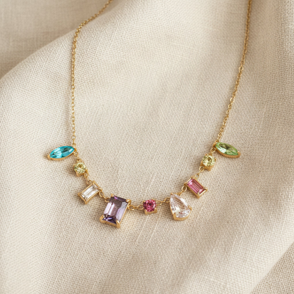The Swarovski Multicolor Crystal Charm Necklace displayed in premium packaging, highlighting its luxury gift appeal.