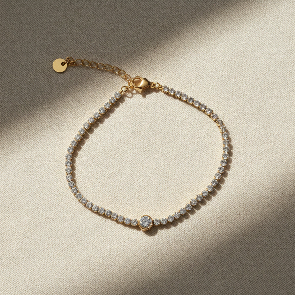 Solitaire Tennis Bracelet close-up of sparkling crystal stones in sleek gold plated setting