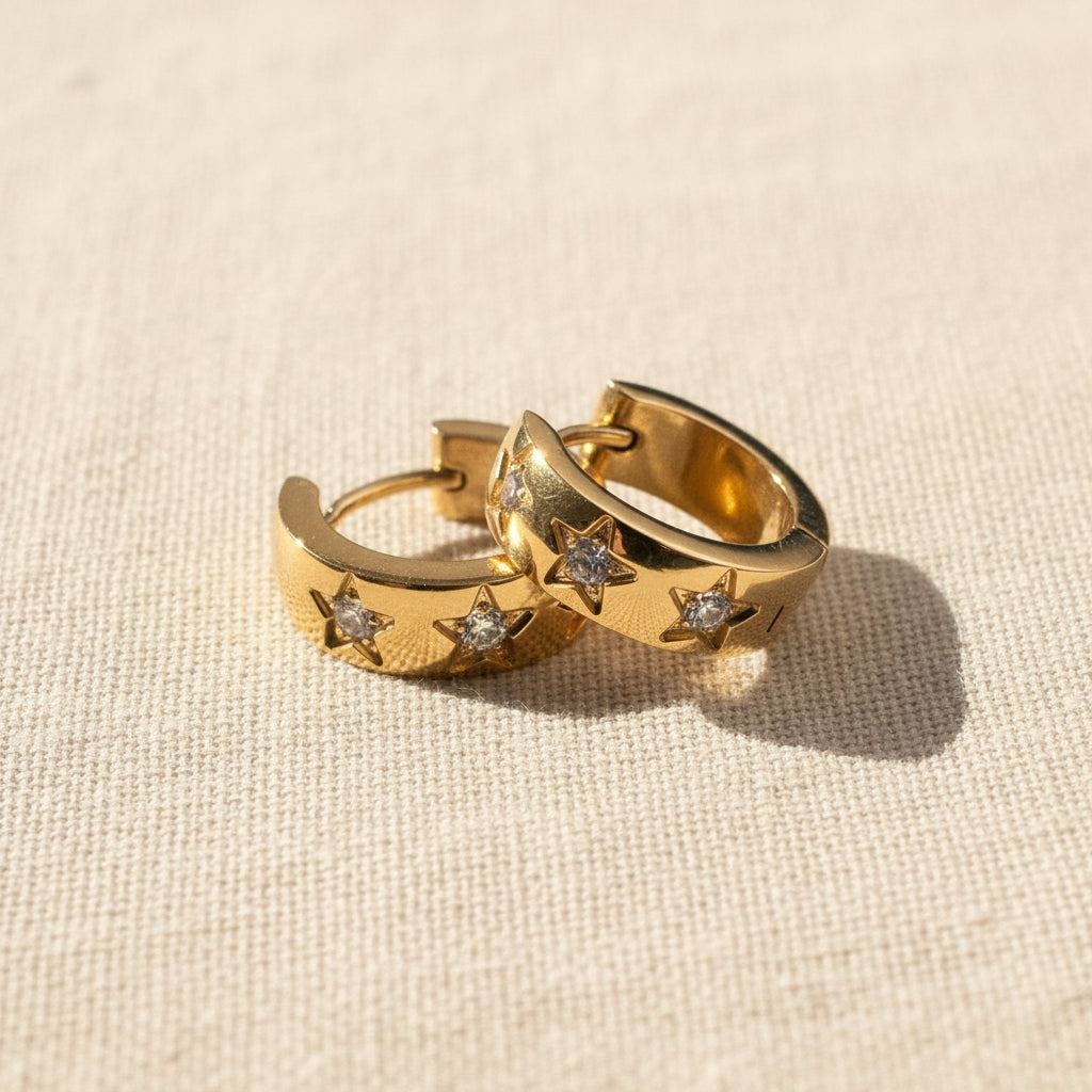 The Star Crystal Hoop Earrings displayed in a premium jewelry box, highlighting their luxury aesthetic as a perfect gift.