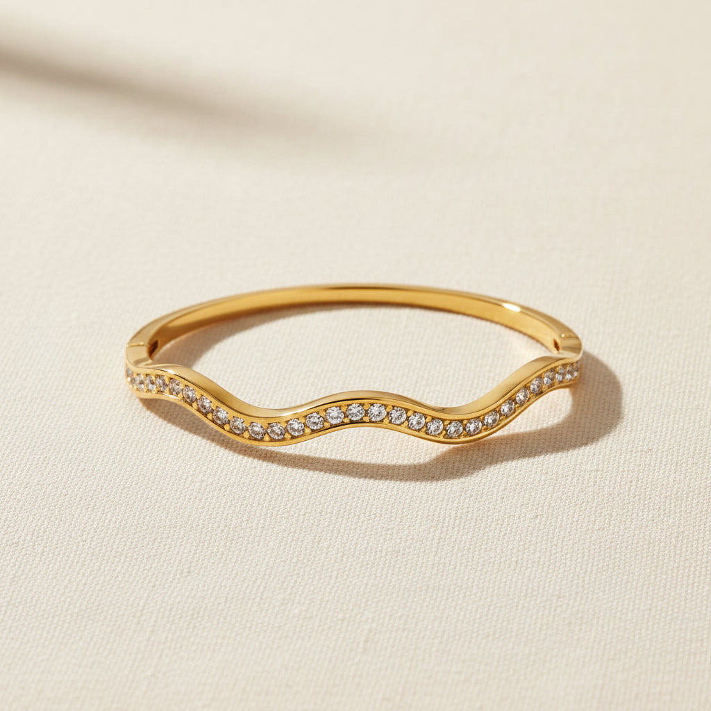 The Aura Stream Crystal Bangle presented in premium Swikaar packaging, making it a sophisticated gift for the modern woman.