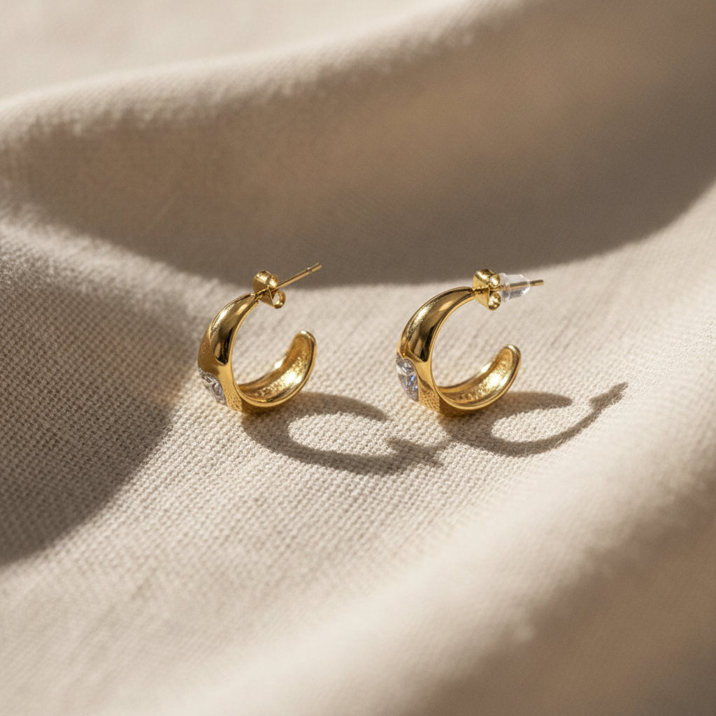 The Golden Curve Heart Stud Earrings presented in premium Swikaar packaging, making them an ideal gift for women.