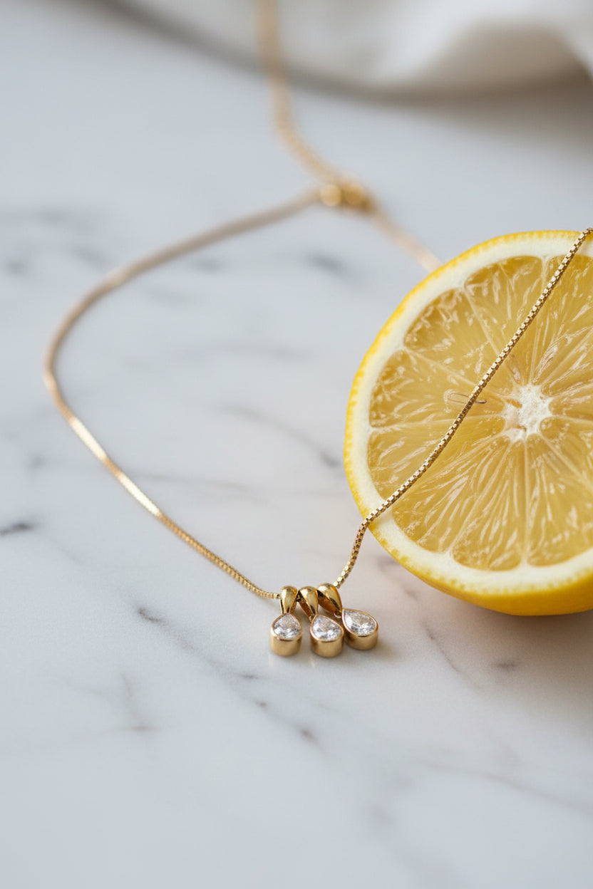Trio Drop Charm Necklace layered with plain gold chain – curated neck stack styling by Swikaar