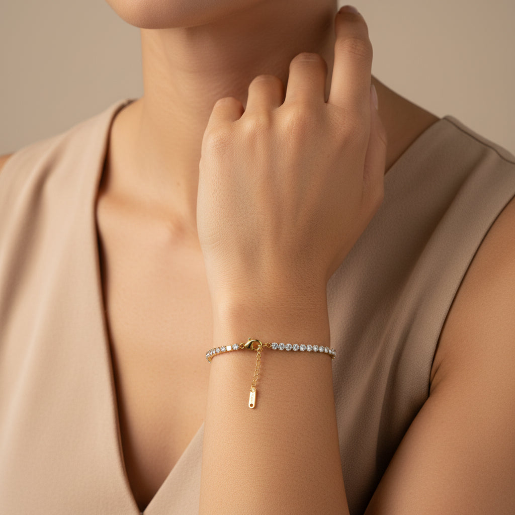 Classic Tennis Bracelet worn on wrist – timeless gold crystal bracelet for women by Swikaar