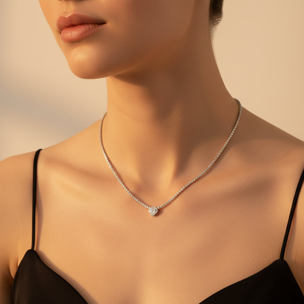Crystal Tennis Necklace with Clover Pendant close-up of four-leaf clover charm and crystal stone setting