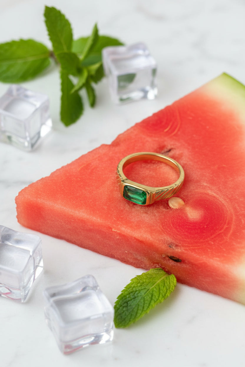 Emerald Royale Statement Ring angle view highlighting emerald stone brilliance in gold plated setting by Swikaar