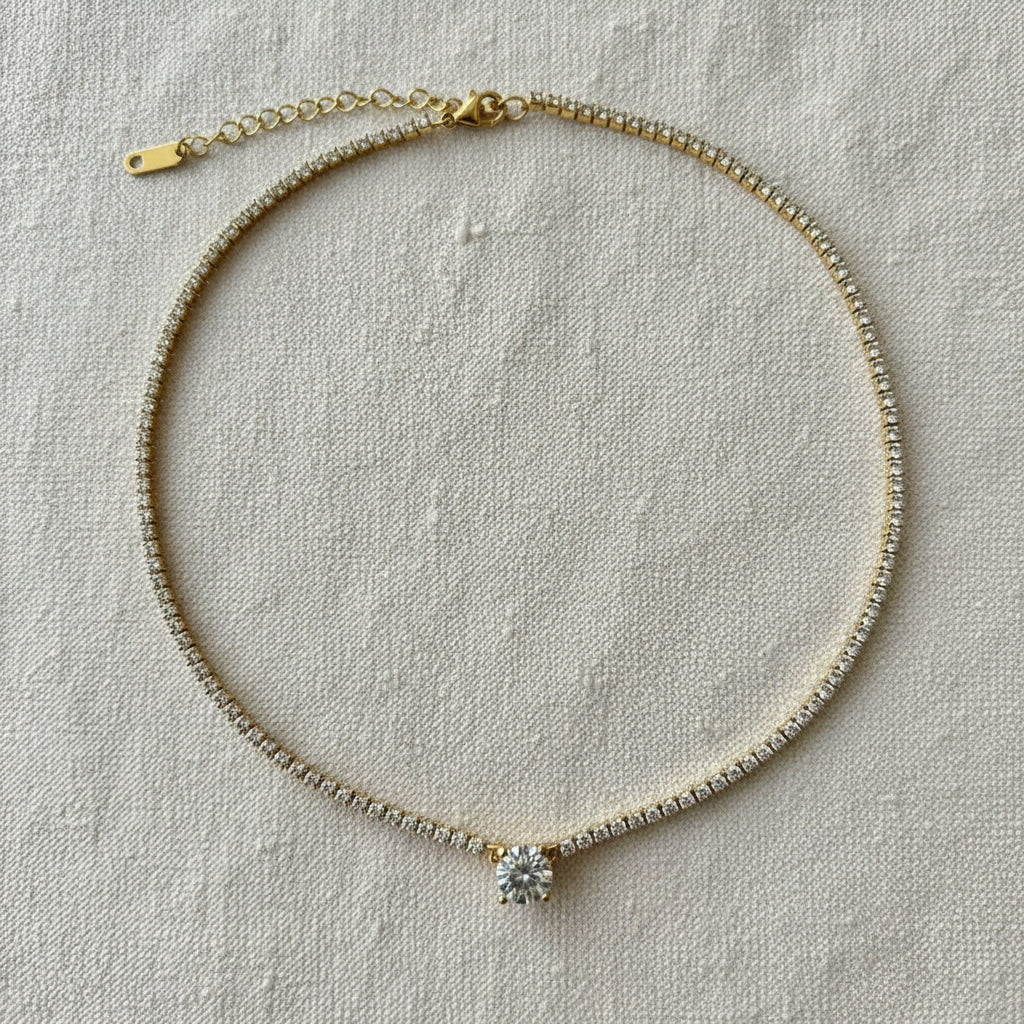 Full Tennis Solitaire Necklace worn around neck – bold gold crystal necklace for women by Swikaar