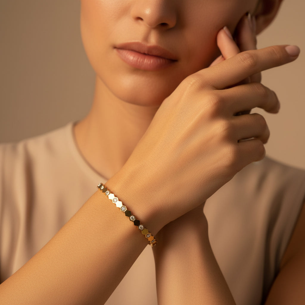 Bracelet with gold and silver beads on a textured surface