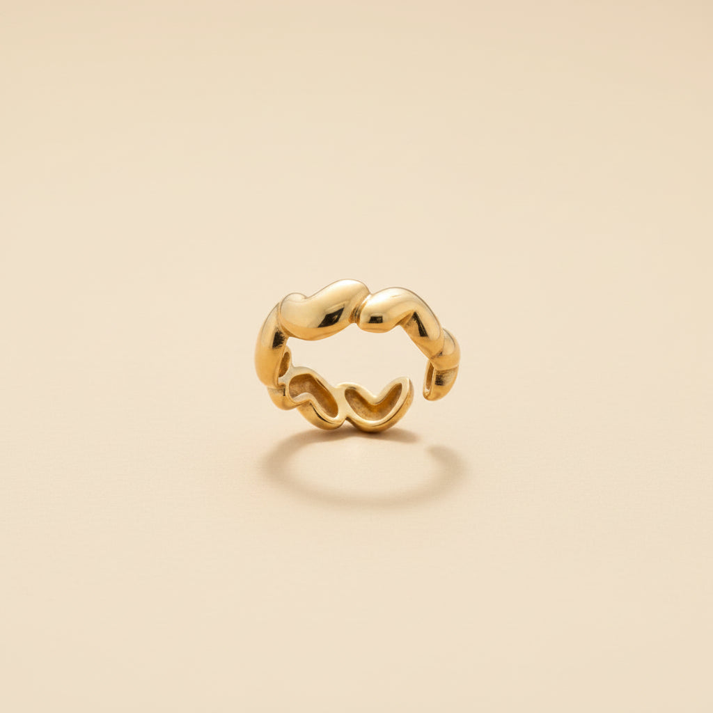 Golden Heart Link Statement Ring close-up of heart link design detail in gold plated setting