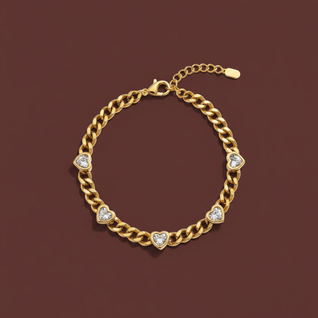Heart Cuban Bracelet worn on wrist – bold gold Cuban chain bracelet with heart charms for women