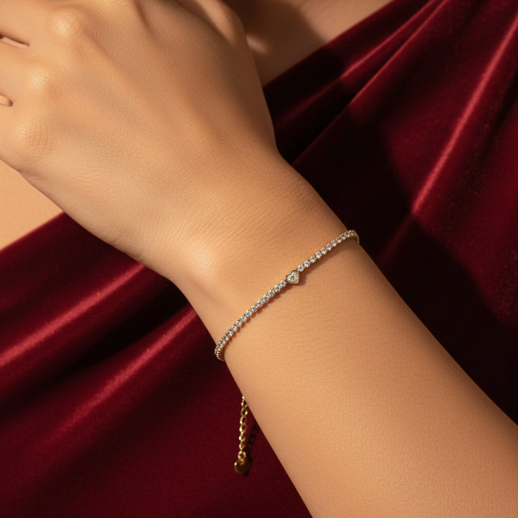 Heart Tennis Bracelet front view showing sparkling crystal stones and romantic heart charm in gold setting