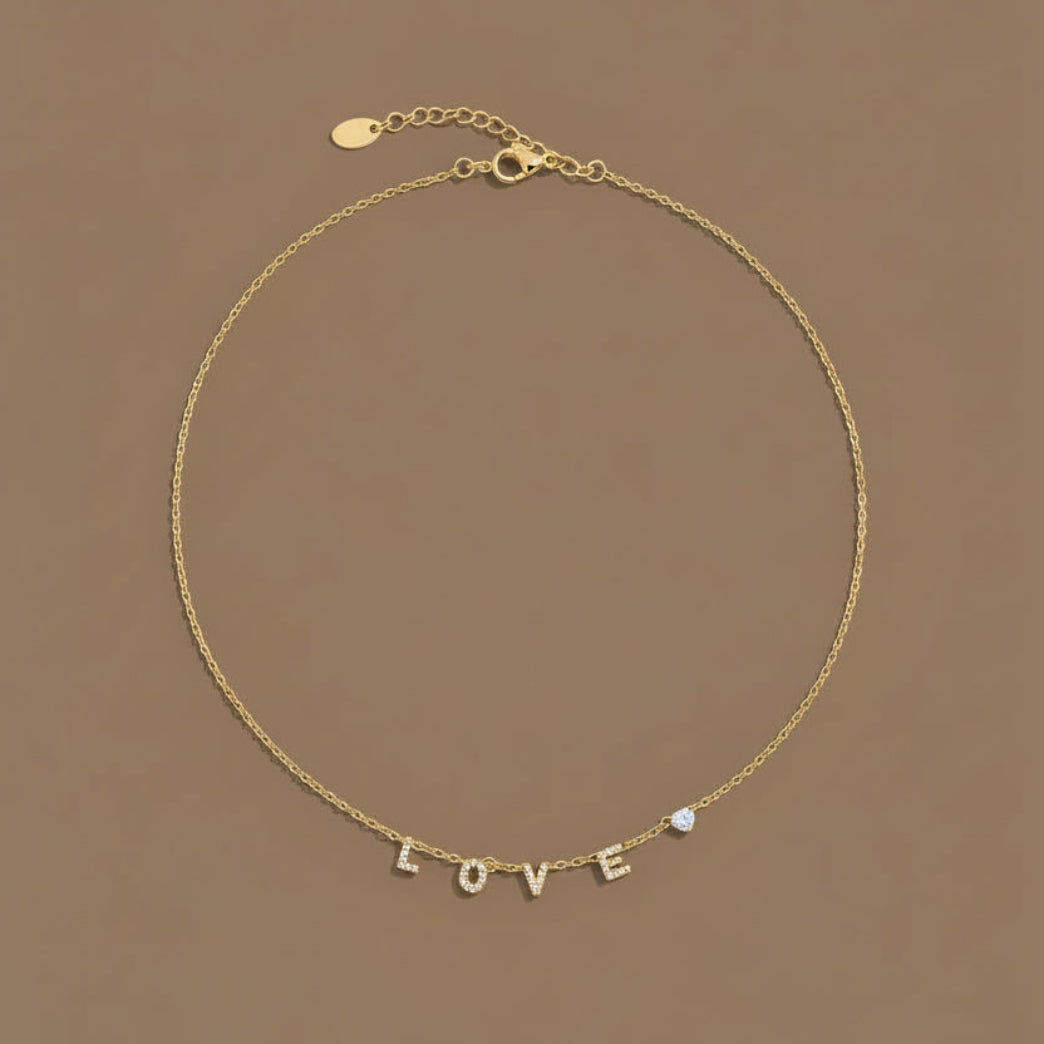 Love Luxe Necklace – gold plated sparkling crystal LOVE letter necklace by Swikaar