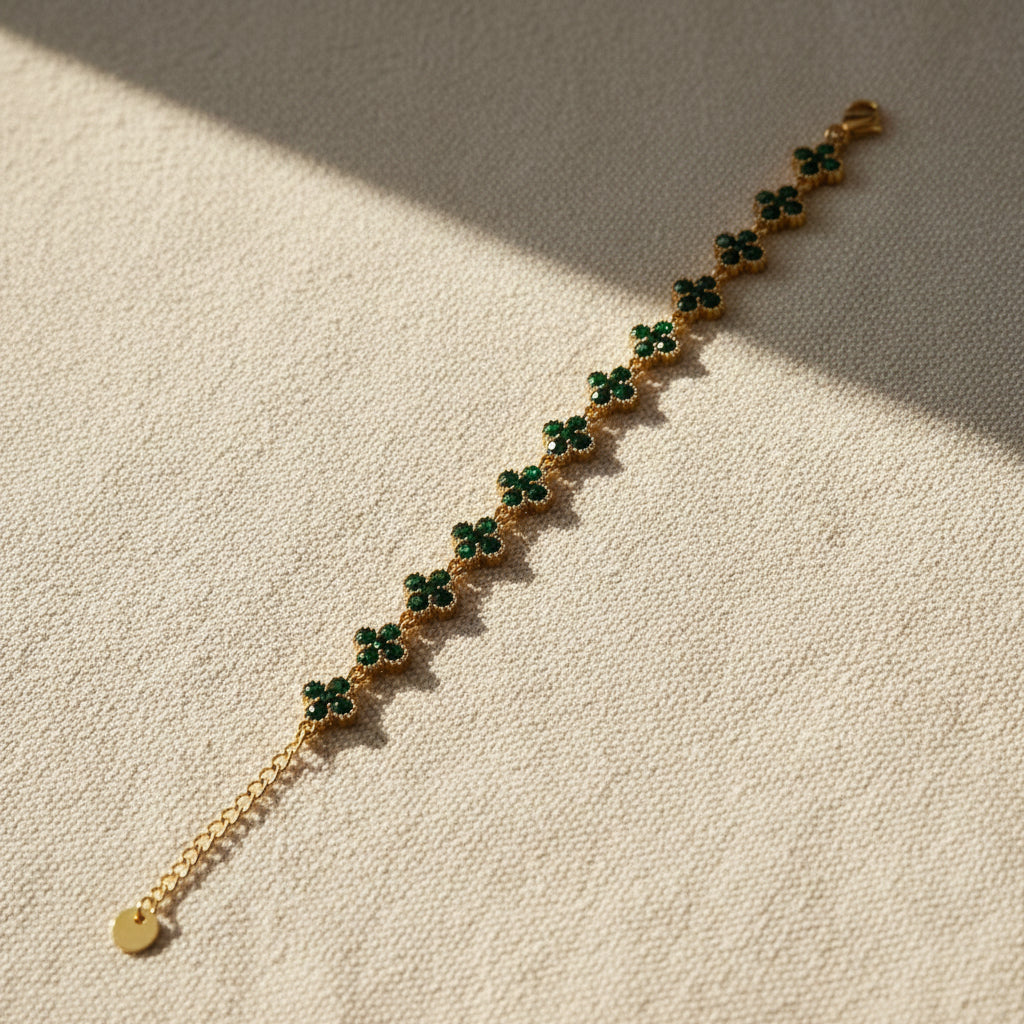 Clover Luxe Bracelet flat lay showing four-leaf clover gold charm detail – Swikaar