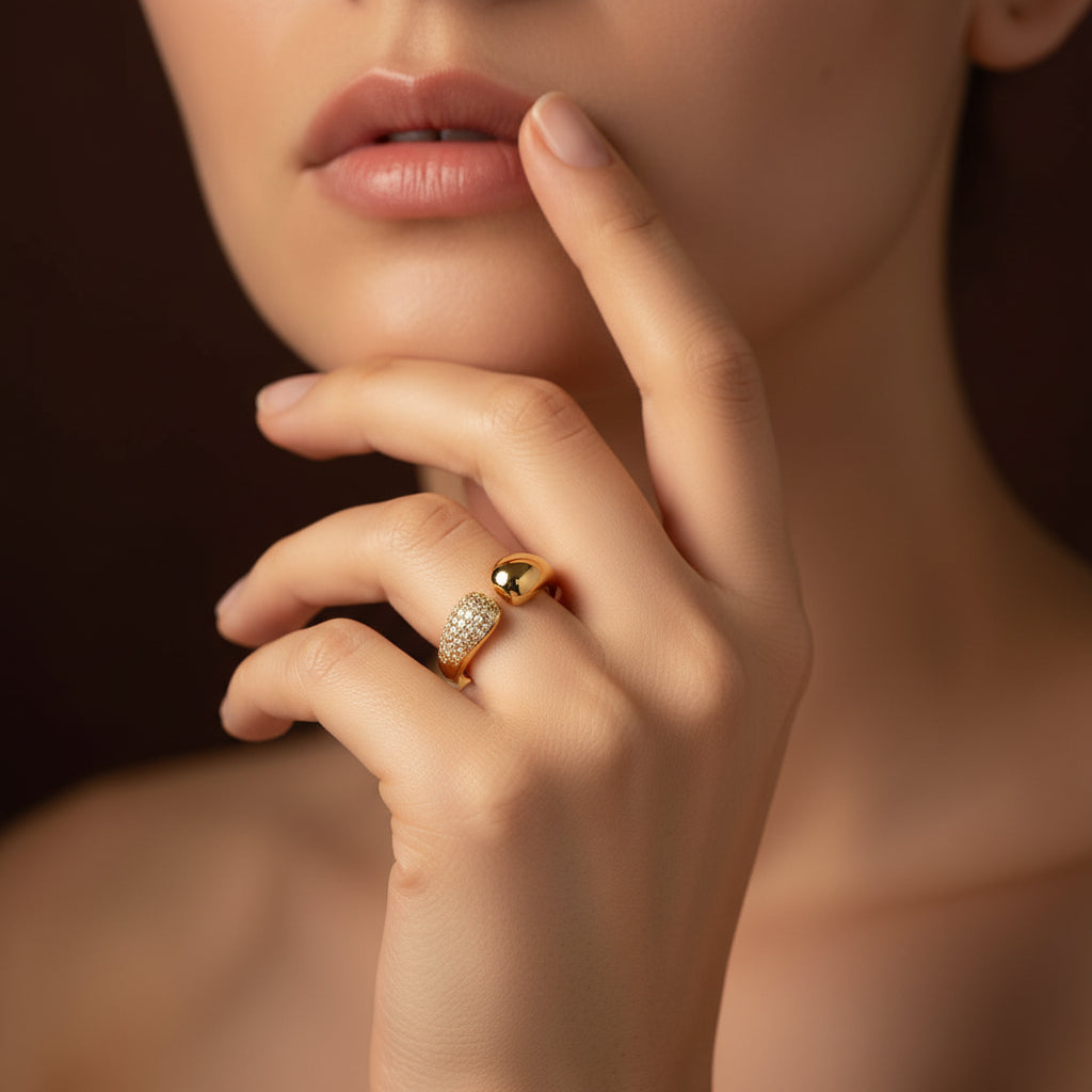 A model wearing the Aurea Dual Luxe Ring to showcase its architectural silhouette and radiant stacked effect on the finger.