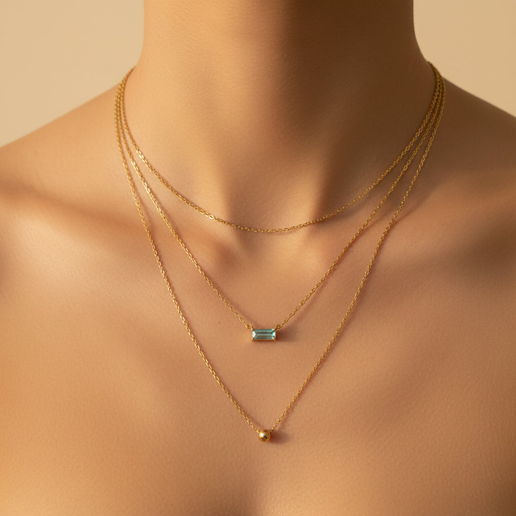 Serene Sky Necklace layered with delicate gold chains for a minimalist jewellery look.
