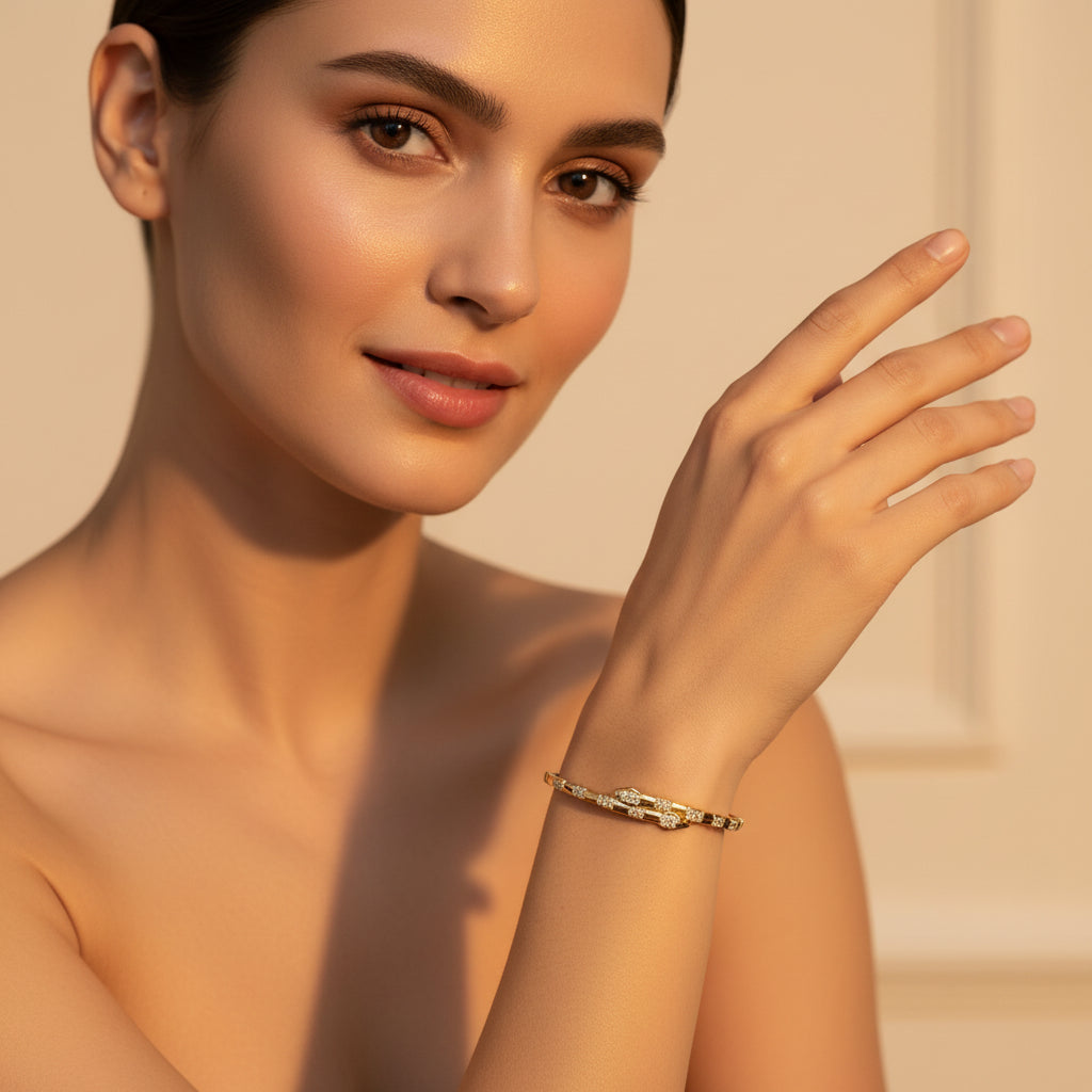 Gold bracelet with diamonds on a white cushion