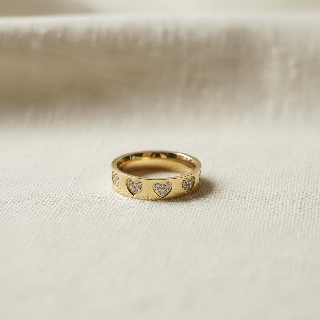 Sparkling Heart Band Ring worn on finger – romantic gold heart crystal ring for women