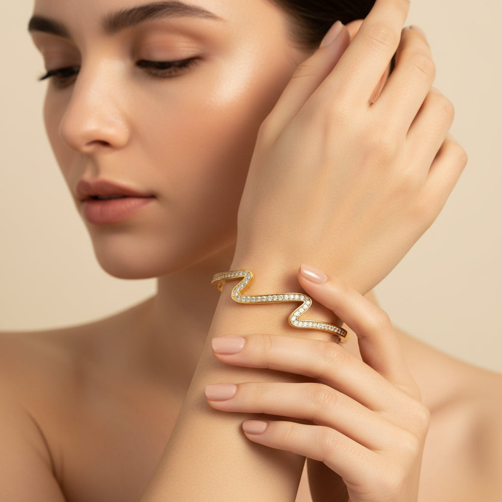The Aurielle Crystal Wave Bangle presented in premium Swikaar packaging, making it a spectacular gift for a special occasion.