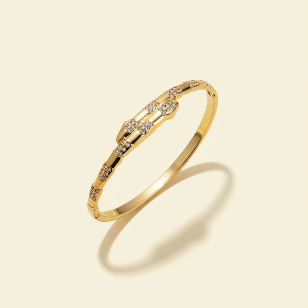 The Serpent Gold Bangle presented in premium Swikaar packaging, making it a perfect statement gift for women.
